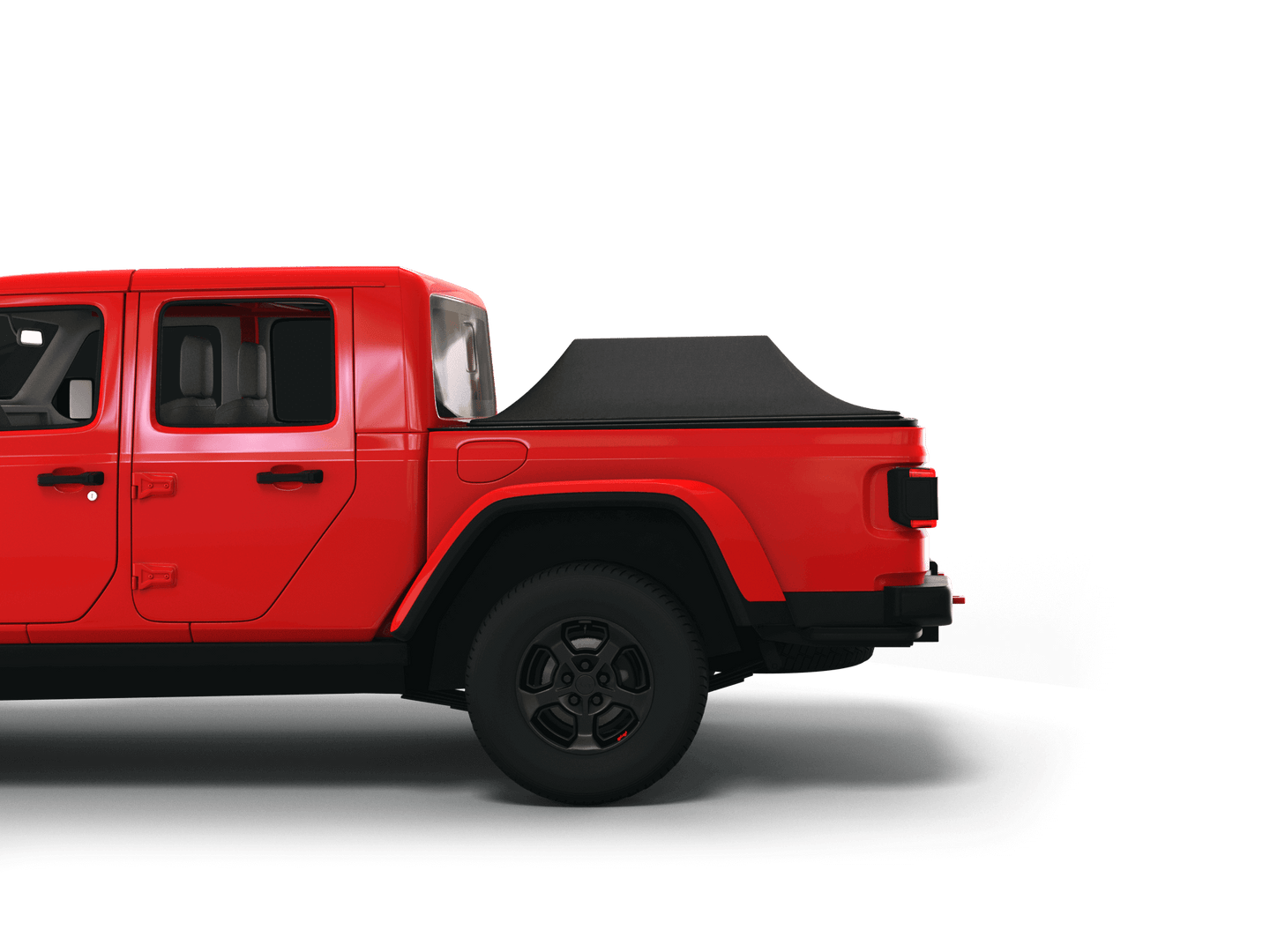 Red Jeep Gladiator with Sawtooth Stretch tonneau cover expanded over cargo load